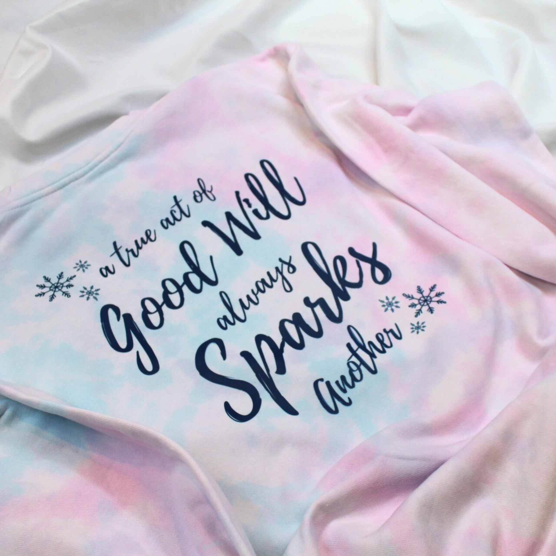 A True Act of Good Always Sparks Another Sweatshirt | Snowflake Pocket Design | Cozy Holiday Pullover | Tie Dye Christmas Sweater