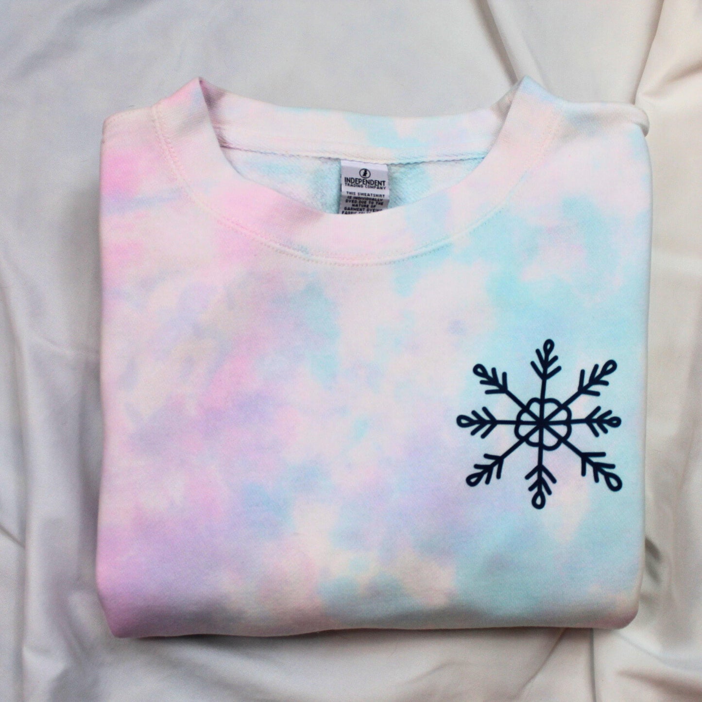 A True Act of Good Always Sparks Another Sweatshirt | Snowflake Pocket Design | Cozy Holiday Pullover | Tie Dye Christmas Sweater